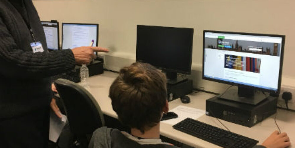 workshop participant looking at a computer