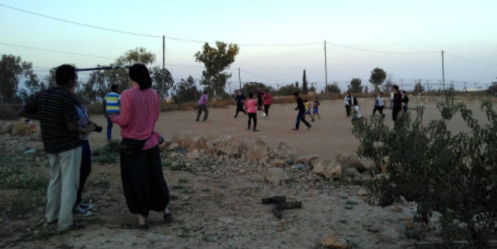 women playing football in the West Bank