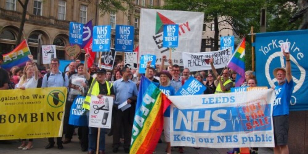 people with banners demonstrating