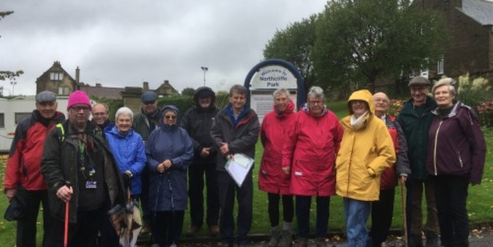 a group of people in the rain