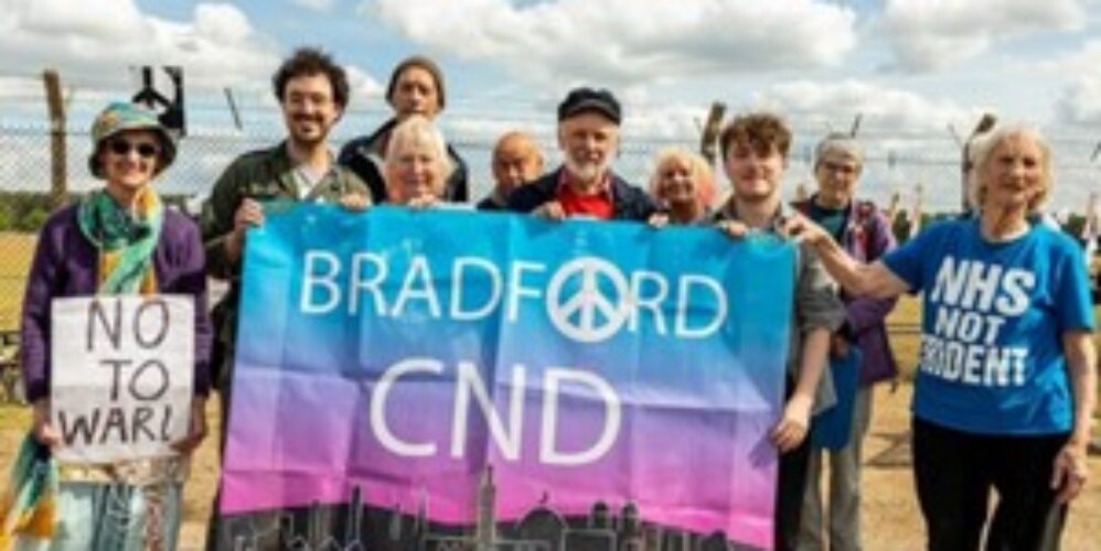 A group of people holding a CND banner