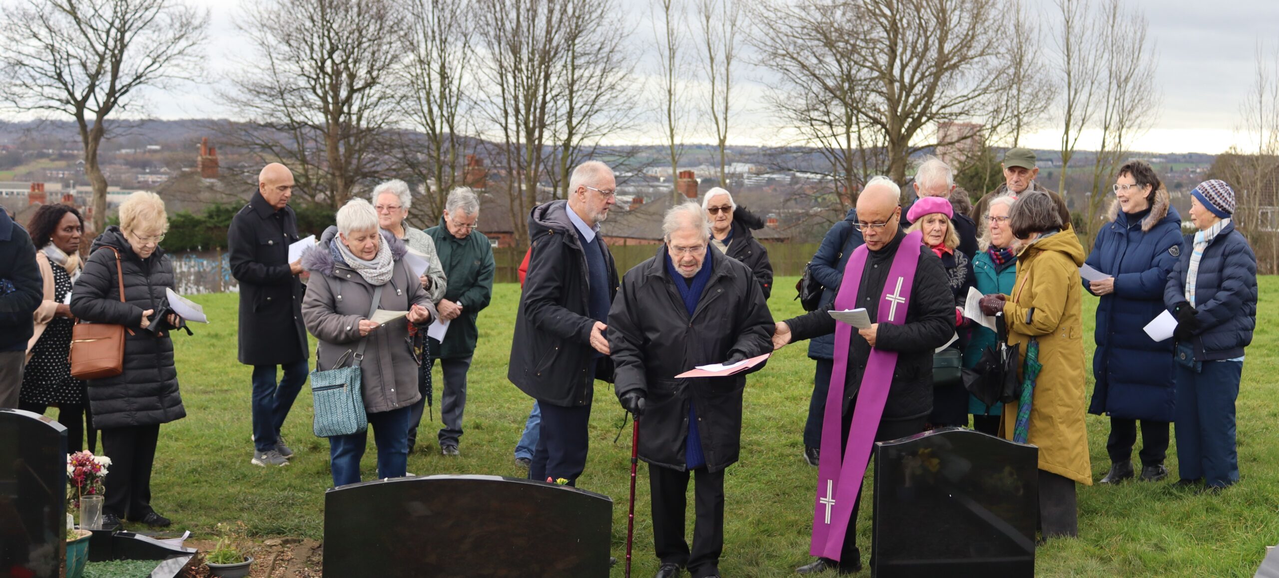 Br Guy service in cemetery